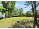 Expansive backyard featuring a lush lawn and a privacy fence, perfect for outdoor activities at 6090 Heritage Se Way, Mableton, GA 30126
