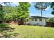 Spacious backyard with deck, offering ample space for recreation and relaxation in a serene outdoor setting at 6090 Heritage Se Way, Mableton, GA 30126