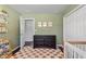 Comfortable Bedroom with a dark dresser and closet providing organization, with neutral colors providing a calming ambiance at 6090 Heritage Se Way, Mableton, GA 30126