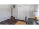 Spacious bedroom with wood-look flooring and a closet, offering plenty of storage and design potential at 6090 Heritage Se Way, Mableton, GA 30126