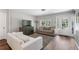 Bright living room with ample natural light, stylish furnishings, and hardwood flooring at 6090 Heritage Se Way, Mableton, GA 30126