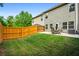 Spacious backyard with green grass, a patio and outdoor furniture at 881 Ash St, Canton, GA 30114