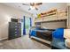 bedroom featuring a bunk bed with toys and a dresser with a TV at 881 Ash St, Canton, GA 30114