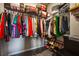 Organized closet with a variety of clothing and shoes at 881 Ash St, Canton, GA 30114