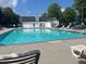 This community pool offers a refreshing escape on sunny days, with ample seating at 881 Ash St, Canton, GA 30114