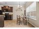 Cozy dining area with dark cabinetry, a stylish table, and natural light creating a warm and inviting atmosphere at 881 Ash St, Canton, GA 30114