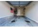 Clean garage with ample storage space, an american flag and epoxy flooring at 881 Ash St, Canton, GA 30114