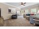 Spacious living room featuring neutral decor, plush carpeting, and large windows for abundant natural light at 881 Ash St, Canton, GA 30114