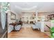 Inviting foyer featuring hardwood floors, decorative lighting, and stairs leading to upper level at 1205 Rivershyre Ne Pkwy, Lawrenceville, GA 30043