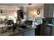 Bright eat-in kitchen featuring granite countertops, stainless appliances, and large windows at 1205 Rivershyre Ne Pkwy, Lawrenceville, GA 30043