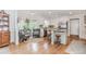 Lovely kitchen boasts white cabinets, stainless steel appliances, and a breakfast bar seating area at 1205 Rivershyre Ne Pkwy, Lawrenceville, GA 30043