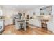 Bright open kitchen with stainless appliances, granite counters, and a center island at 1205 Rivershyre Ne Pkwy, Lawrenceville, GA 30043