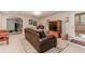 Basement living room featuring comfortable seating, media center, and casual relaxation space at 1205 Rivershyre Ne Pkwy, Lawrenceville, GA 30043