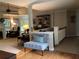 Spacious living room with hardwood floors and lots of natural light coming through the open floor plan at 1205 Rivershyre Ne Pkwy, Lawrenceville, GA 30043