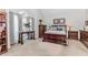 This main bedroom features a vaulted ceiling, neutral carpet, and a mahogany furniture set at 1205 Rivershyre Ne Pkwy, Lawrenceville, GA 30043