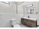 Bathroom featuring a stylish vanity, sleek fixtures, and modern tiling at 1887 Shalimar Dr, Atlanta, GA 30345