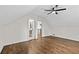 Large bedroom with hardwood floors, neutral walls, ceiling fan and access to an adjacent bathroom with updated features at 1887 Shalimar Dr, Atlanta, GA 30345