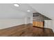 Bright living space with hardwood floors, recessed lighting, and a wet bar with natural wood cabinets at 1887 Shalimar Dr, Atlanta, GA 30345