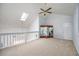 Bright bonus room with carpeted floors, skylight and vaulted ceiling at 2507 Albion Farm Way, Duluth, GA 30097