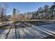 Scenic park with mature trees and a paved pathway at 2628 Amberly Dr, Dunwoody, GA 30360