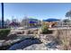 Community playground with covered picnic area, climbing structures, and a decorative rock water feature at 2628 Amberly Dr, Dunwoody, GA 30360