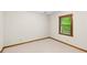 Neutral bedroom with a window providing ample natural light at 3802 Sw Knights Bridge Sw Rd, Lilburn, GA 30047