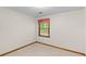 Neutral bedroom with a window providing ample natural light at 3802 Sw Knights Bridge Sw Rd, Lilburn, GA 30047