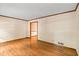 Bright, spacious living room with gleaming wood floors and neutral walls at 3802 Sw Knights Bridge Sw Rd, Lilburn, GA 30047