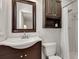 Bathroom with a vanity, toilet, framed mirror and shower with a white curtain at 1448 Diamond Head Cir, Decatur, GA 30033