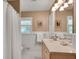 Bathroom featuring a white tiled wall, vanity, mirror, and shower with a white curtain at 1448 Diamond Head Cir, Decatur, GA 30033