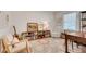 Bright office space with built-in bookshelves, stylish decor, and ample natural light at 1448 Diamond Head Cir, Decatur, GA 30033