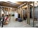 Unfinished basement featuring exposed beams and an open layout, offering customization potential at 200 Scouts Ridge Dr, Covington, GA 30016