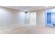 Finished basement with a neutral carpet, recessed lighting, and an open layout for flexible usage at 251 Waterford Cove Dr, Suwanee, GA 30024