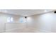 Spacious basement with windows allowing natural light, and recessed lighting illuminating the neutral carpet at 251 Waterford Cove Dr, Suwanee, GA 30024