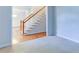 Living room features include a carpeted floor, light gray walls, and staircase at 251 Waterford Cove Dr, Suwanee, GA 30024