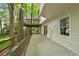 Exterior shot of a large patio with a wooden fence and a second story balcony at 2935 Leafwood Se Dr, Marietta, GA 30067
