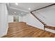 Spacious basement with wood-look flooring and a sliding glass door for natural light at 2935 Leafwood Se Dr, Marietta, GA 30067