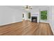 Bright living room with hardwood floors, a fireplace, and an open layout at 2935 Leafwood Se Dr, Marietta, GA 30067