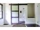 Bathroom featuring sliding barn door, white subway tile, and black and white accent tiles at 6715 Wright Rd, Sandy Springs, GA 30328