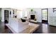 Cozy living room featuring a fireplace, stylish decor, and a barn door feature at 6715 Wright Rd, Sandy Springs, GA 30328