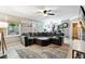 Comfortable living room with a sectional sofa, lots of natural light, and outside access at 4031 E Meadow Dr, Duluth, GA 30096