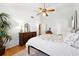 Spacious main bedroom showcasing a vaulted ceiling, hardwood floors, and an abundance of natural light at 4031 E Meadow Dr, Duluth, GA 30096