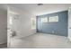 This bedroom features two bright windows and has an ensuite bathroom at 4627 Piston Sw Jct, Mableton, GA 30126