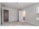 This bedroom is a blank canvas with a carpeted floor and natural light at 4627 Piston Sw Jct, Mableton, GA 30126