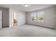 Bedroom with carpet and two windows with light pouring in at 4627 Piston Sw Jct, Mableton, GA 30126
