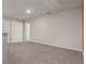 Neutral bedroom with plush carpeting, fresh paint, ample natural light, and two doors at 4627 Piston Sw Jct, Mableton, GA 30126