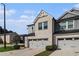 Charming townhome with a brick and gray facade, a two-car garage, and a well manicured lawn at 4627 Piston Sw Jct, Mableton, GA 30126