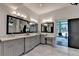 Elegant bathroom features dual sinks, granite counters, and modern fixtures at 1168 Atcheson Ln, Atlanta, GA 30338
