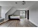 Bedroom with hardwood floors, a window seat under a window, neutral walls, and recessed lighting at 1168 Atcheson Ln, Atlanta, GA 30338