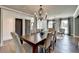 Dining room featuring hardwood floors, chandelier lighting, and neutral décor at 1168 Atcheson Ln, Atlanta, GA 30338